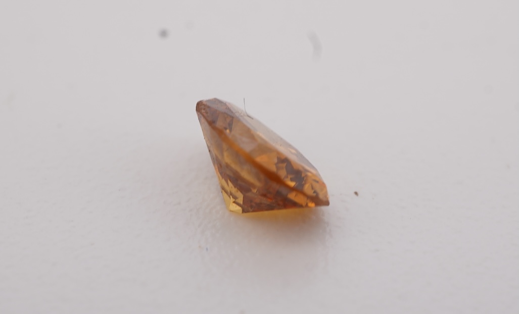An unmounted Fancy Deep Brown-Orange diamond, the oval natural diamond measuring 5.3 x 3.9 x 2.5mm, with treated colour, weighing 0.34 carats, Accompanied by GIA report no. 6233434030, stating that the Fancy Deep Brown-O